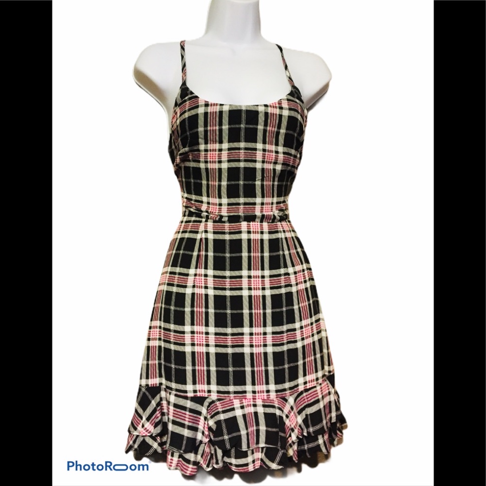 About us pleaded dress.